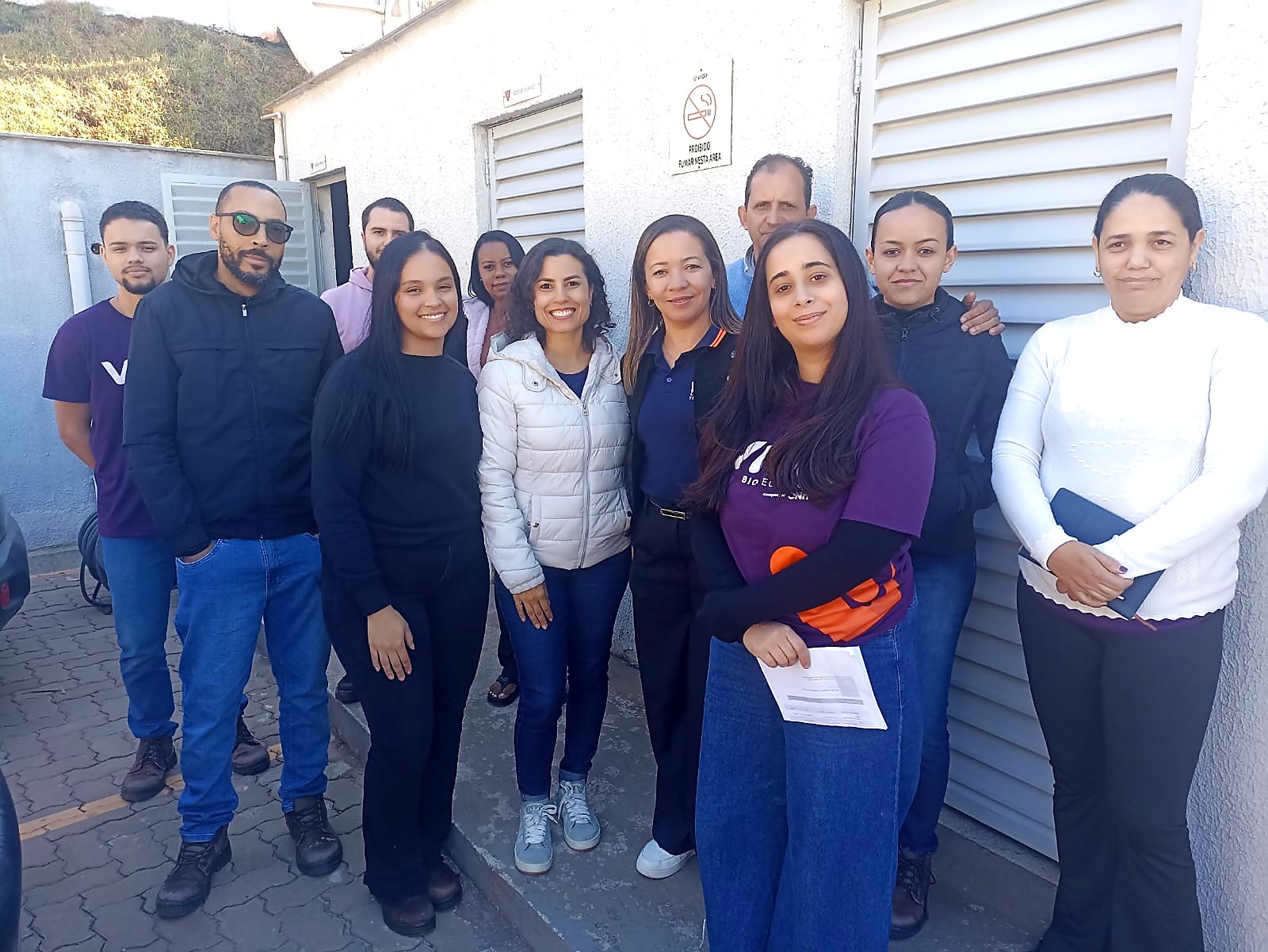 Equipe da D&L com clientes e parceiros